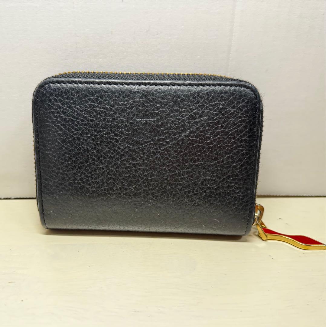 クリスチャンルブタン　スタッズ付き黒レザーケース