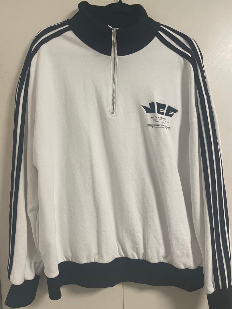 NEE ハーフジップ
