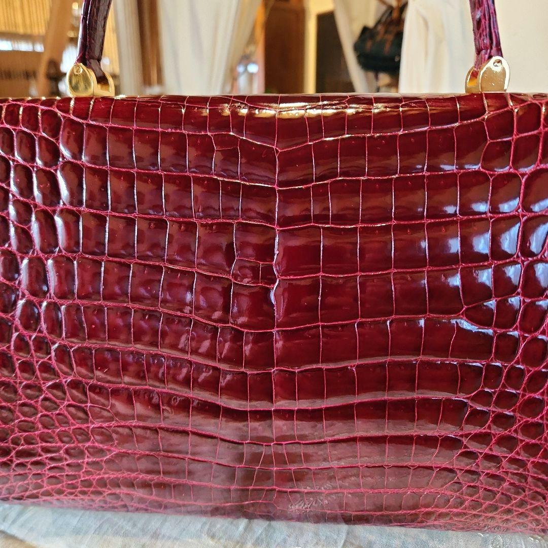クロコダイル グレージング シャイニング ハンドバッグ