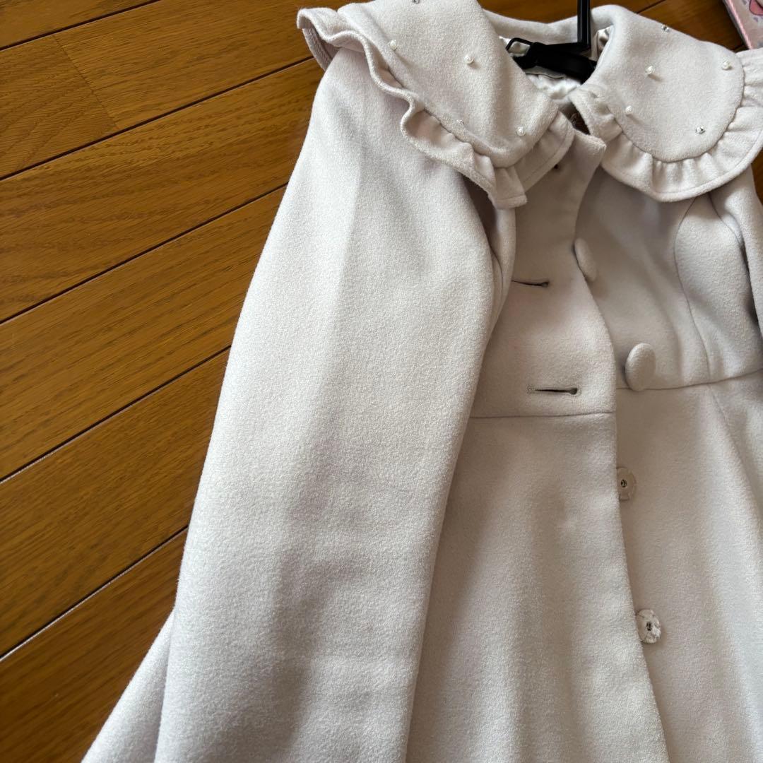 pium ピウム ビジューカラードーリーフレアコート ピンク