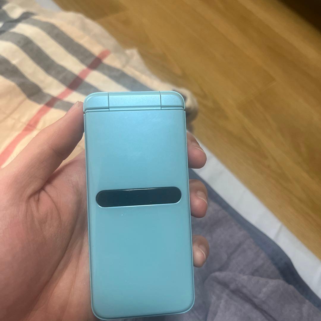 au HITACHI GRATINA KYF42 折りたたみ式携帯電話 水色-日本初の公式