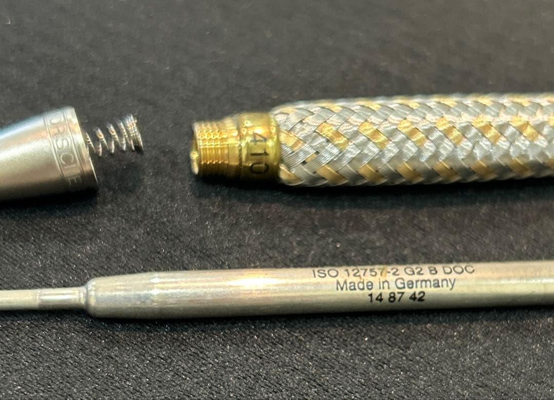 ポルシェデザイン 編み込みボールペン ステンレス、k14ゴールド中古品