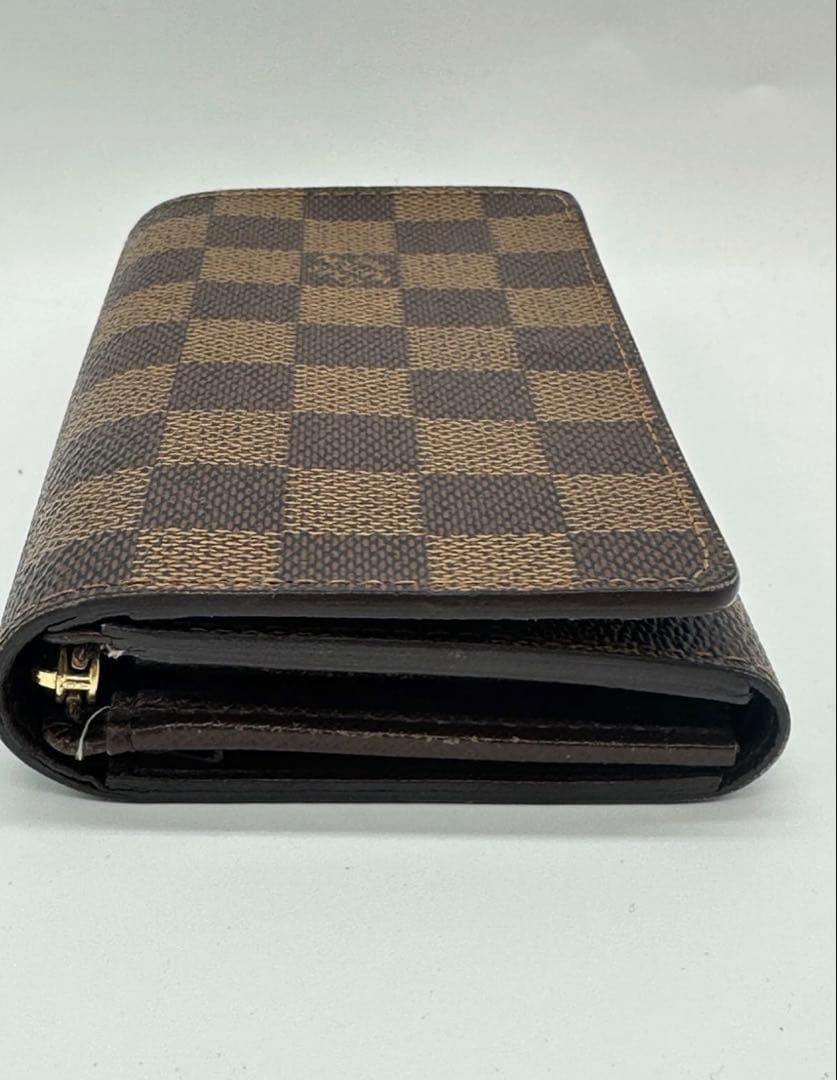 ルイヴィトン ダミエ エベヌ ポルトモネビエ トレゾール 二つ折り財布