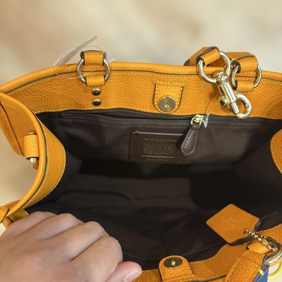 い*ご様 オレンジ レザー ショルダーバッグ ハンドル付き