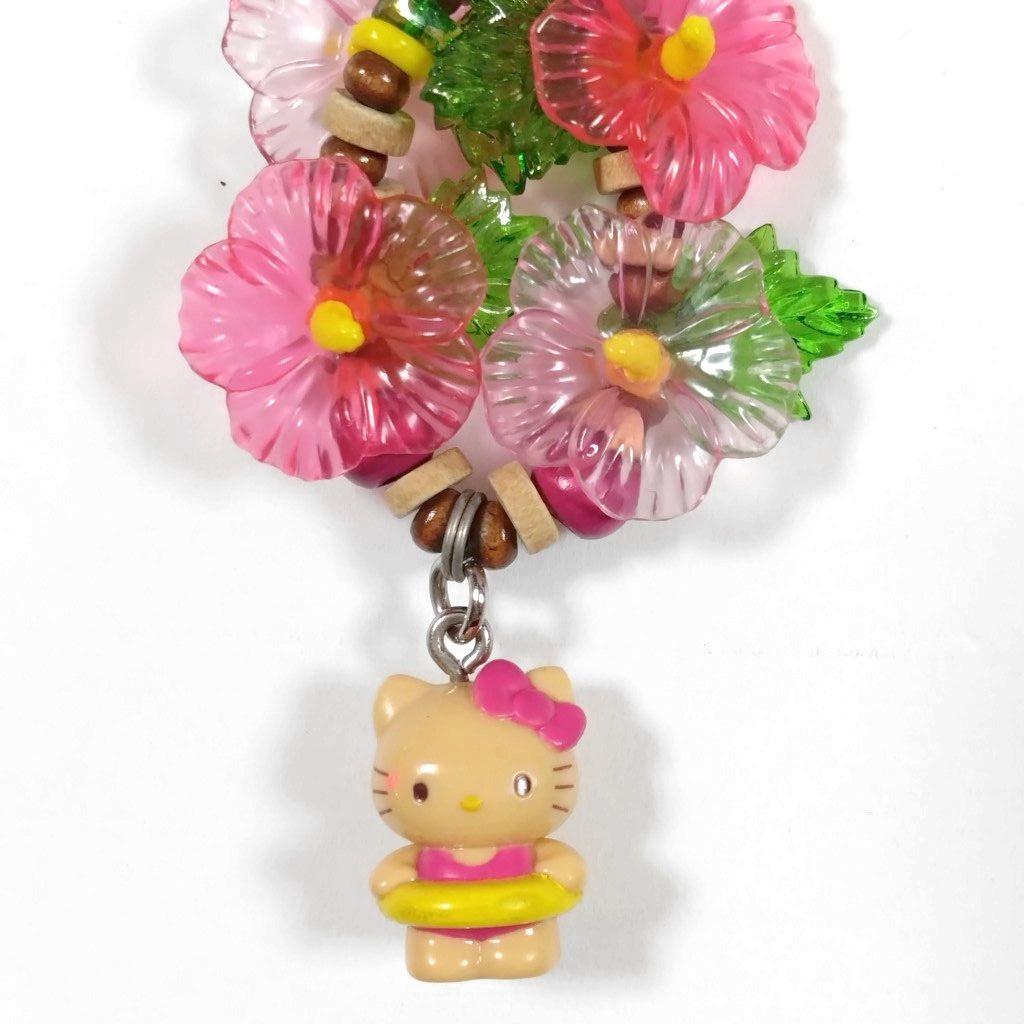 ハローキティ■夏が好き　日焼け　浮輪　水着　ハイビスカス　ファスナーマスコット