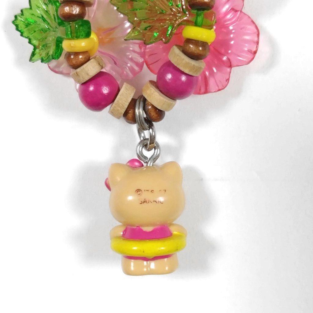 ハローキティ■夏が好き　日焼け　浮輪　水着　ハイビスカス　ファスナーマスコット