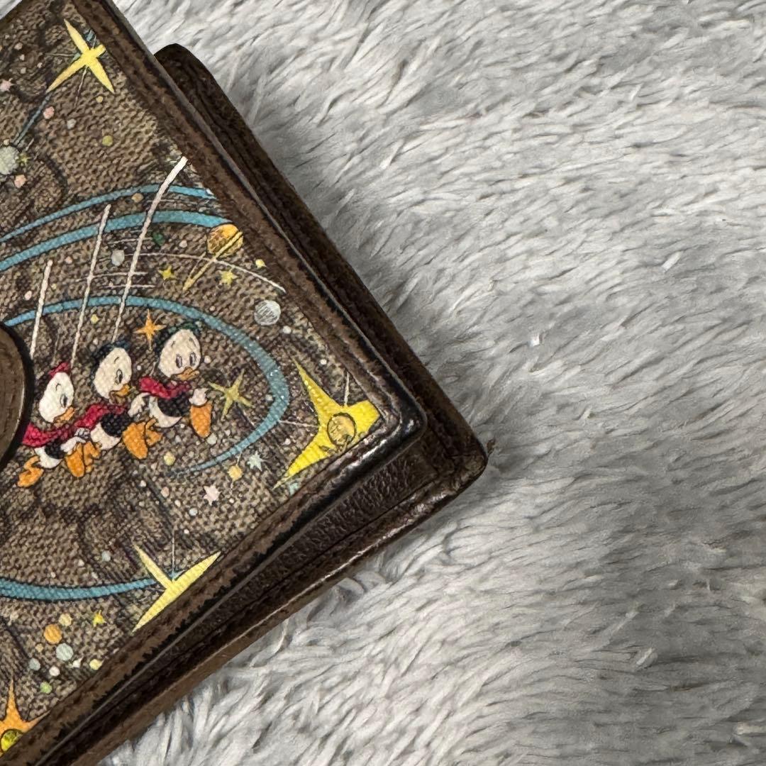 GUCCI Disney 二つ折り財布 ドナルドの通販はau PAY マーケット - 輸入