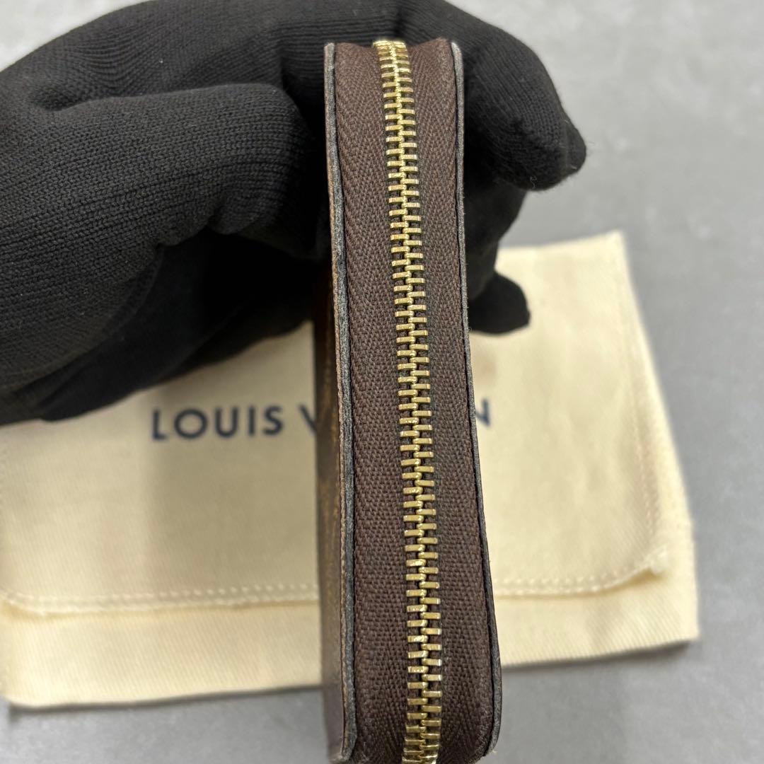 YUNO　ジャイアントモノグラム ジッピーケース M69354