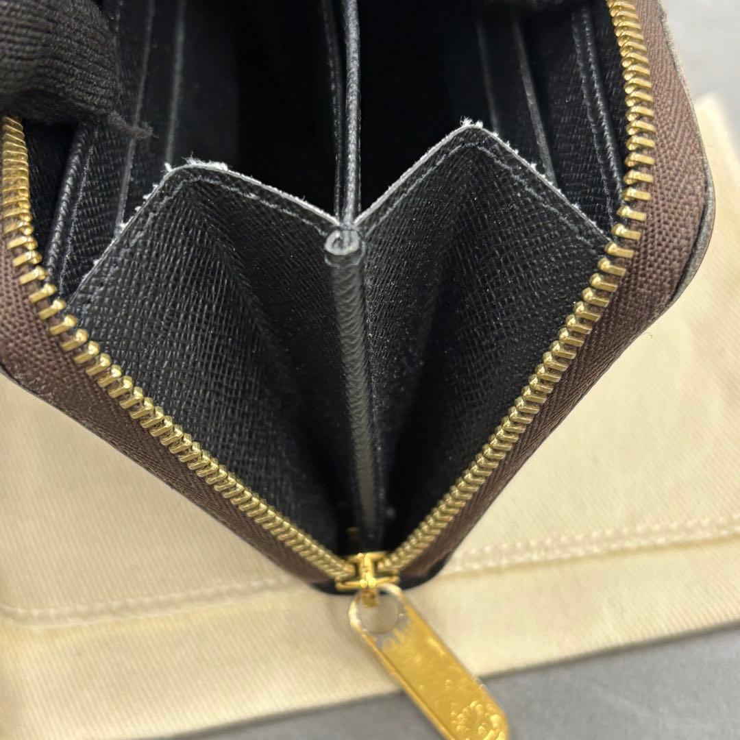 YUNO　ジャイアントモノグラム ジッピーケース M69354