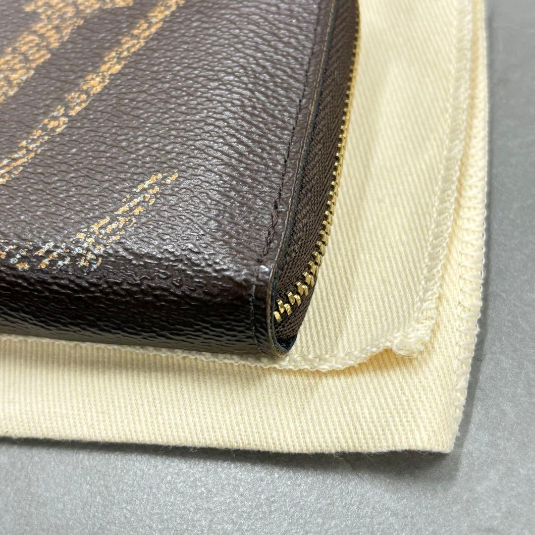 YUNO　ジャイアントモノグラム ジッピーケース M69354