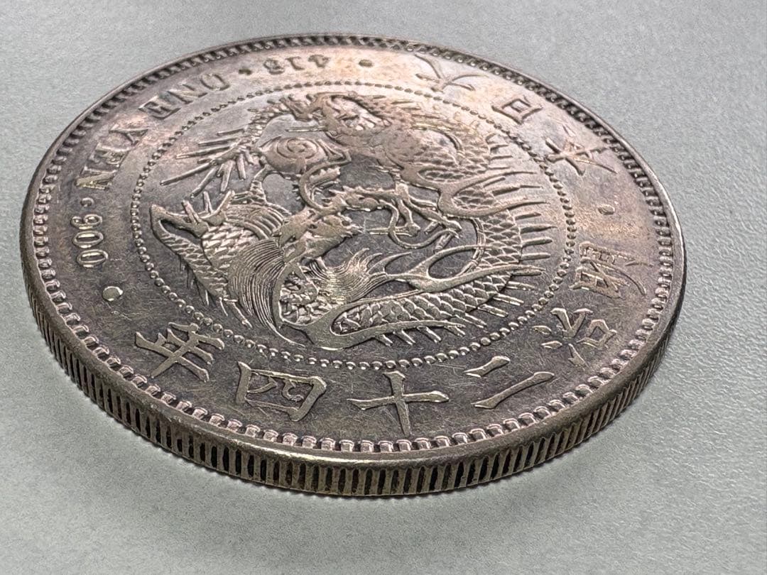 K*1様 【本物保証】一圓銀貨 丸銀左打 明治24年銘