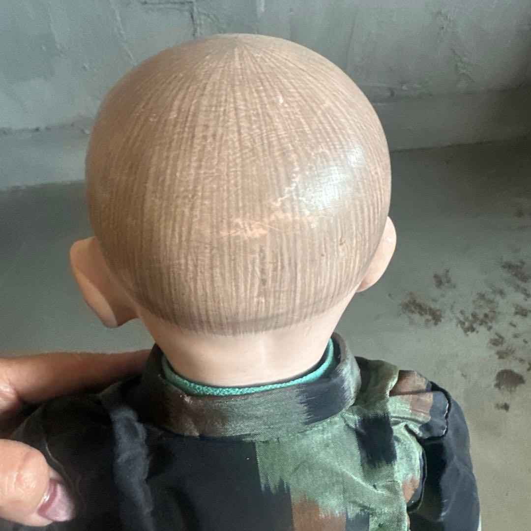 ヴィンテージ 市松人形 男の子 黒と緑の模様 市松人形の写真素材｜写真