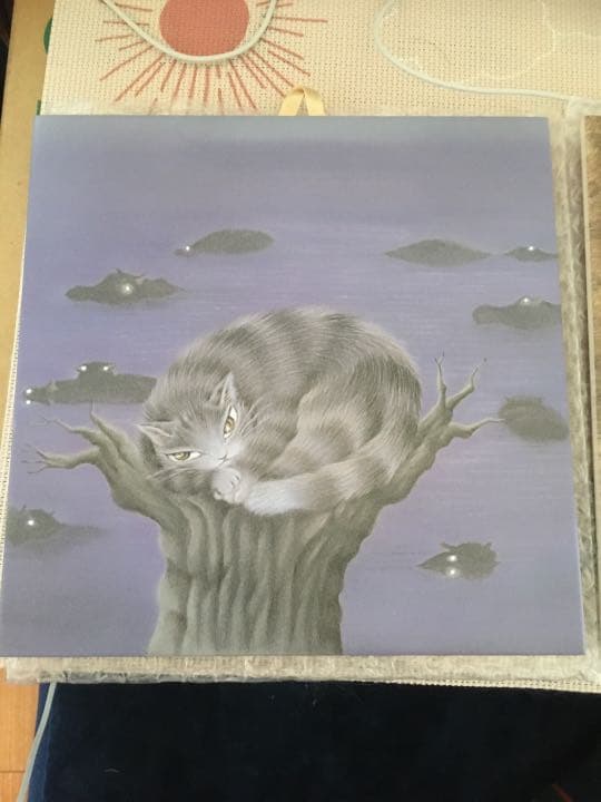 猫の絵、ものタイルに猫の絵を描いています。