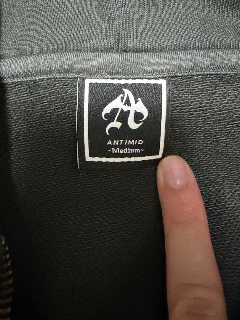 トップス ANTIMID ZIP HOODIE