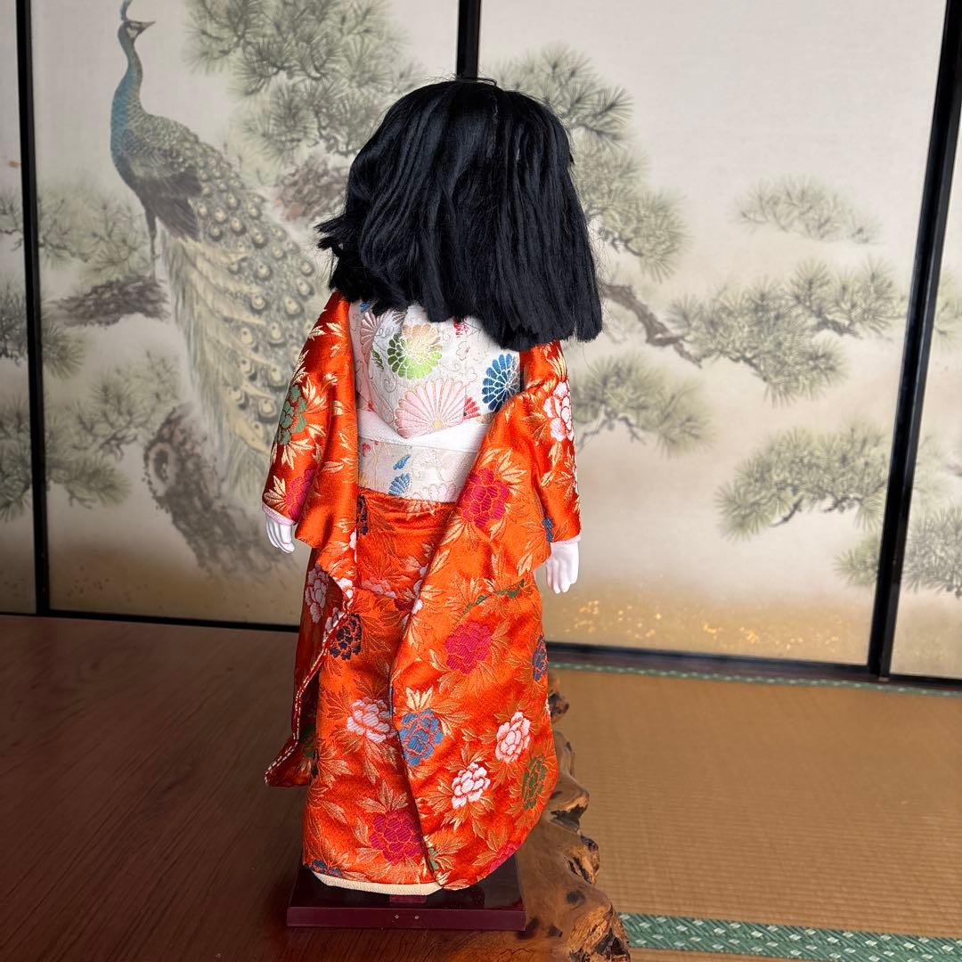 市松人形 オレンジ色 花柄着物 - メルカリ