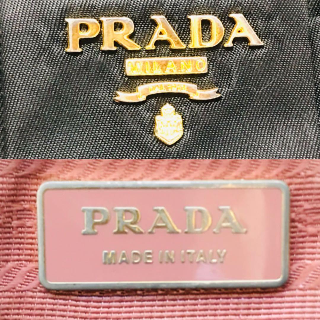 【美品】プラダ ハンドバッグ リボン ゴールドロゴ ナイロン 黒 ロゴプレート