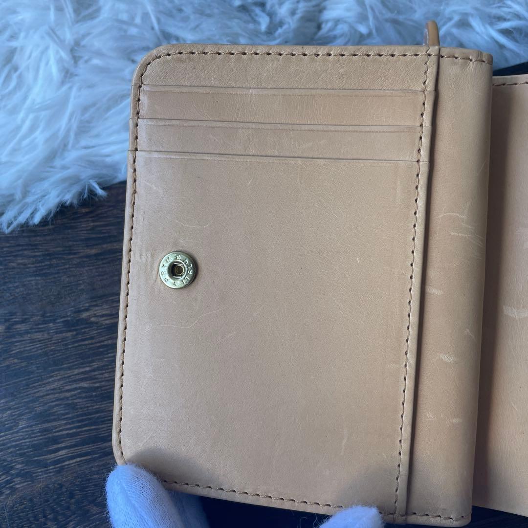 極美品】ゲンテン フラッターカットワーク 二つ折り財布 ヌメベージュ