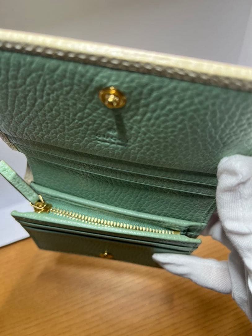 GUCCI GGマーモント 二つ折り財布