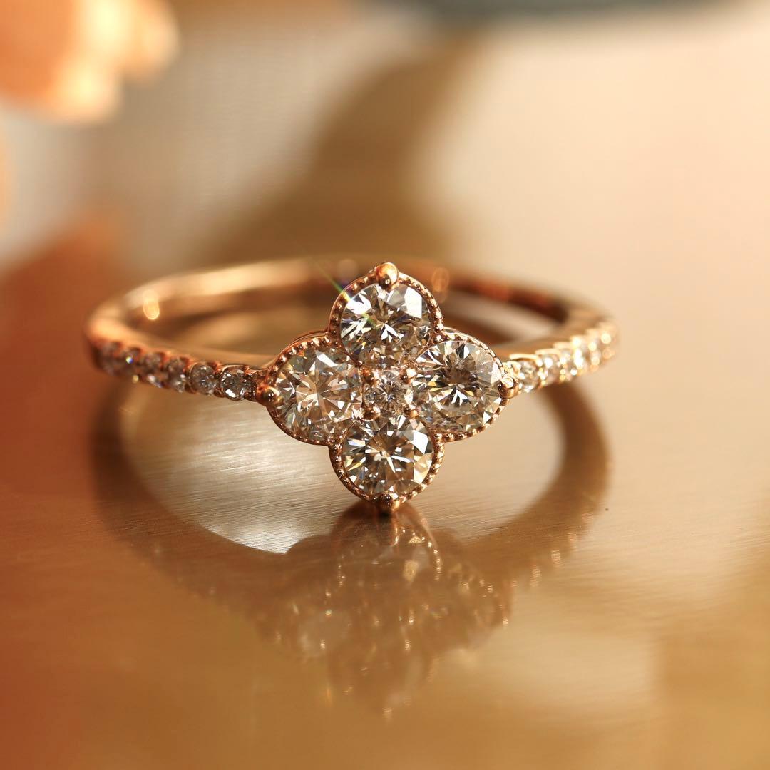 鑑別書付 K18PG 0.71ct四つ葉クローバーミル打ち天然ダイヤモンドリング