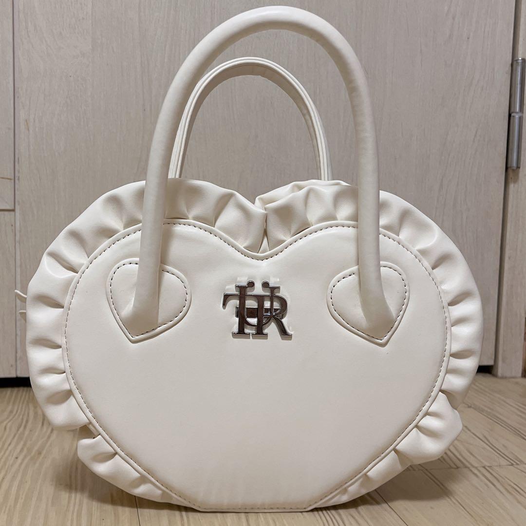 Treat Urself original leather heart bag