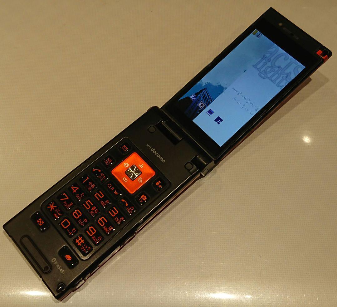 ドコモ docomo P-04B オレンジ ガラケー ゲーム ガンダム 携帯 - メルカリ