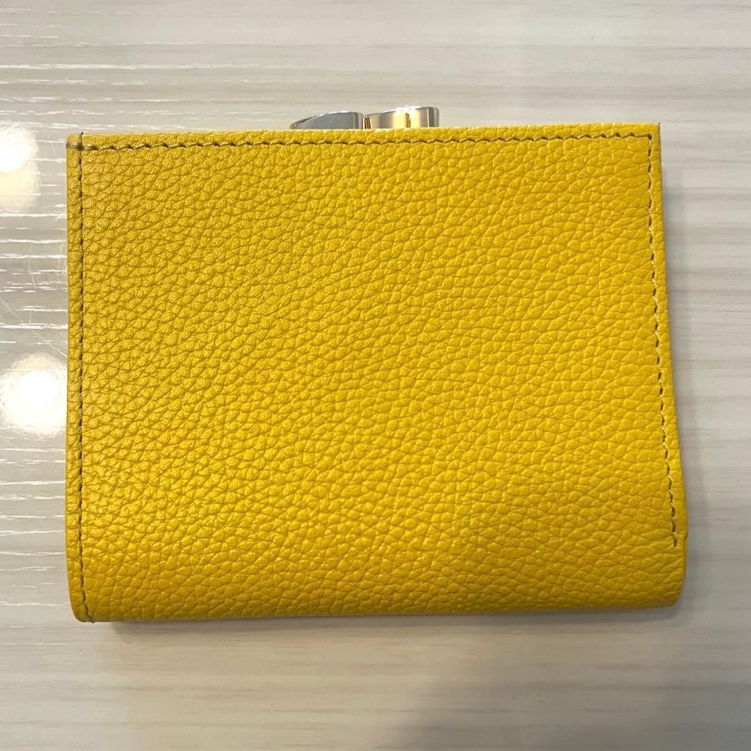 新品・未使用】皇居 二つ折り財布 黄色 イエロー がま口 - メルカリ
