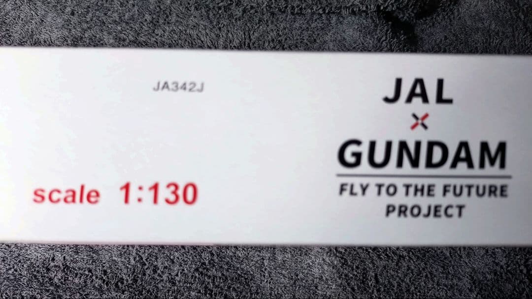 日本航空 ミャクミャク仕様「JALガンダムJET」モデルプレーン木製台座