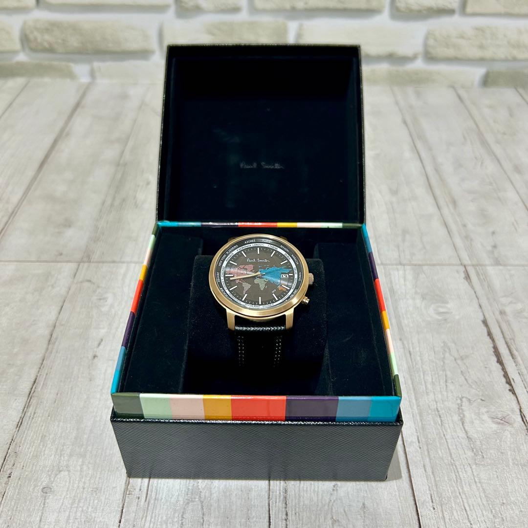 未使用級☆ポールスミス ワールドトラベラー　ソーラー電波ウォッチ　箱付　腕時計