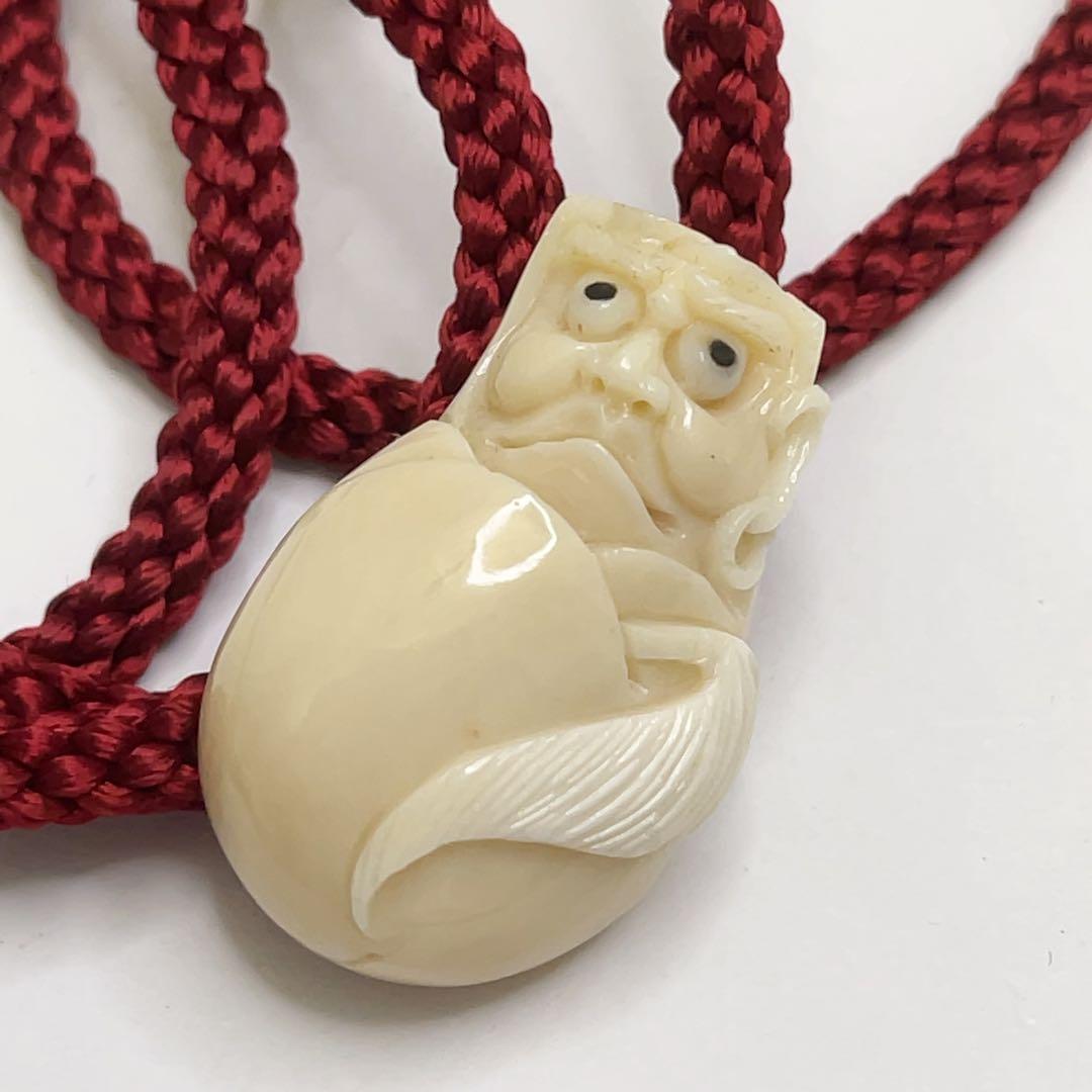 縁起物 ダルマ/達磨彫刻 ホワイト珊瑚 本珊瑚 ループタイ