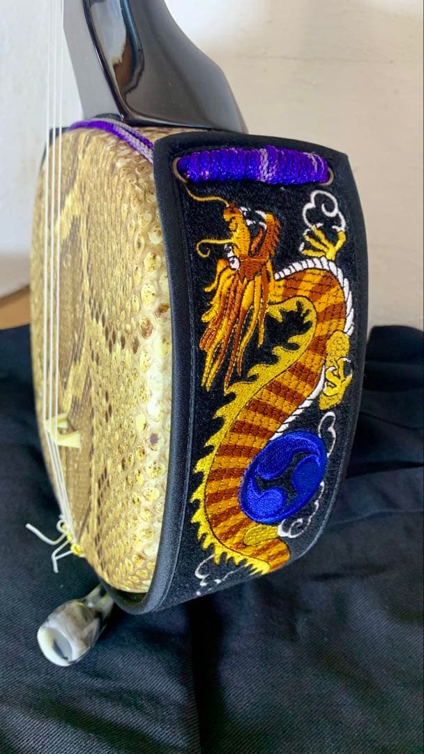 三線 沖縄 両面蛇皮 表側強化二重張り カラクイ1本弦2本