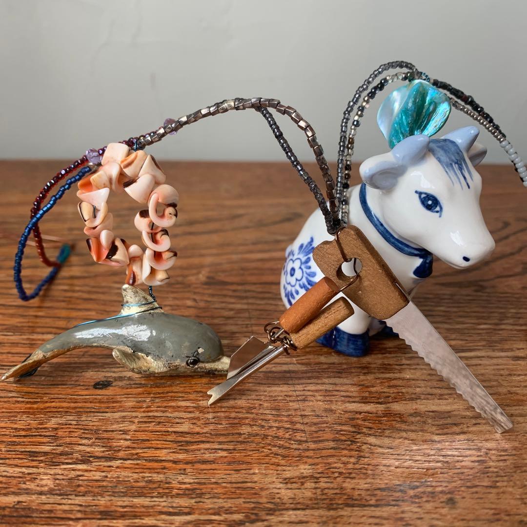 妻の作った 古物のガーランド ミノタウロスのまわりで製作していた男