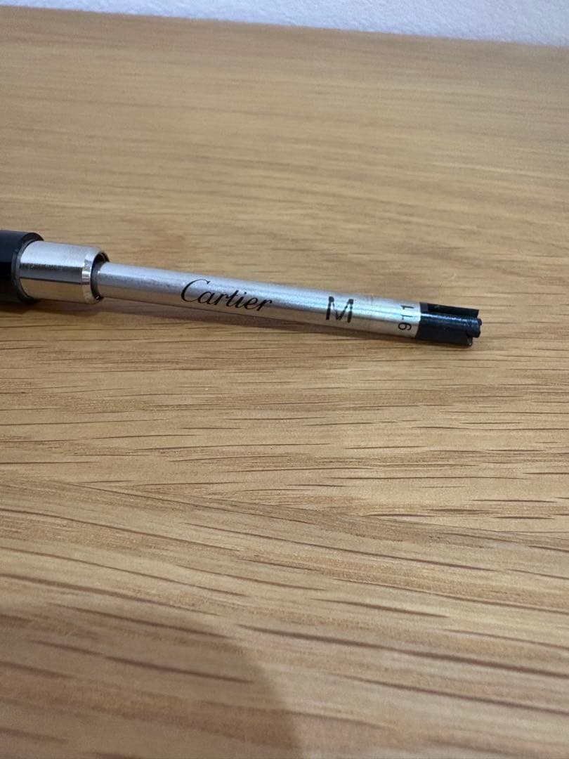 イニシャル刻印あり カルティエ ブルーサファイアボールペン - メルカリ