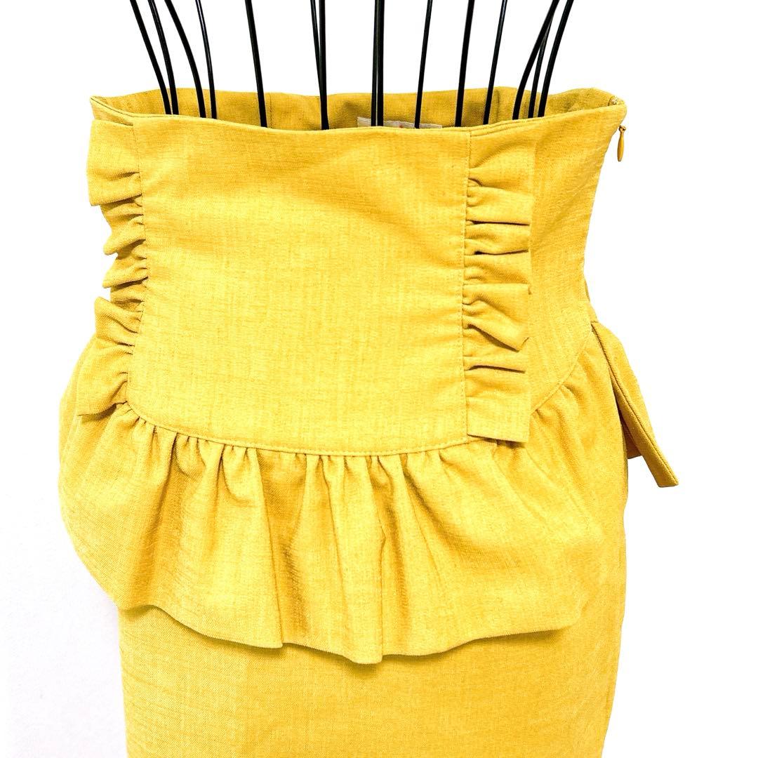 【新品タグ付】manielle ペプラムフリルスカート ゴールド【adk001】