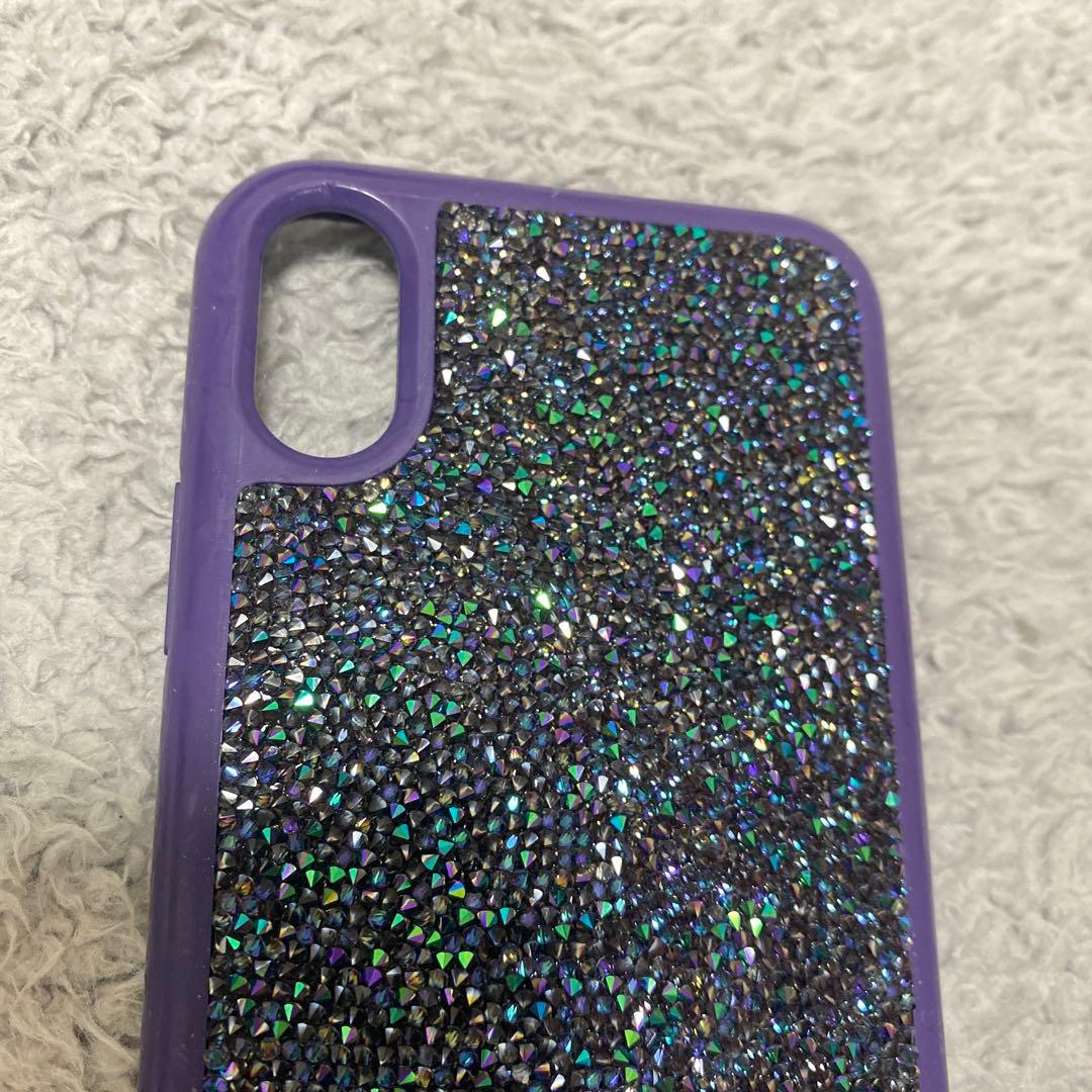 SWAROVSKIスワロフスキー iPhone X/XSケース 紫 スマホケース - メルカリ