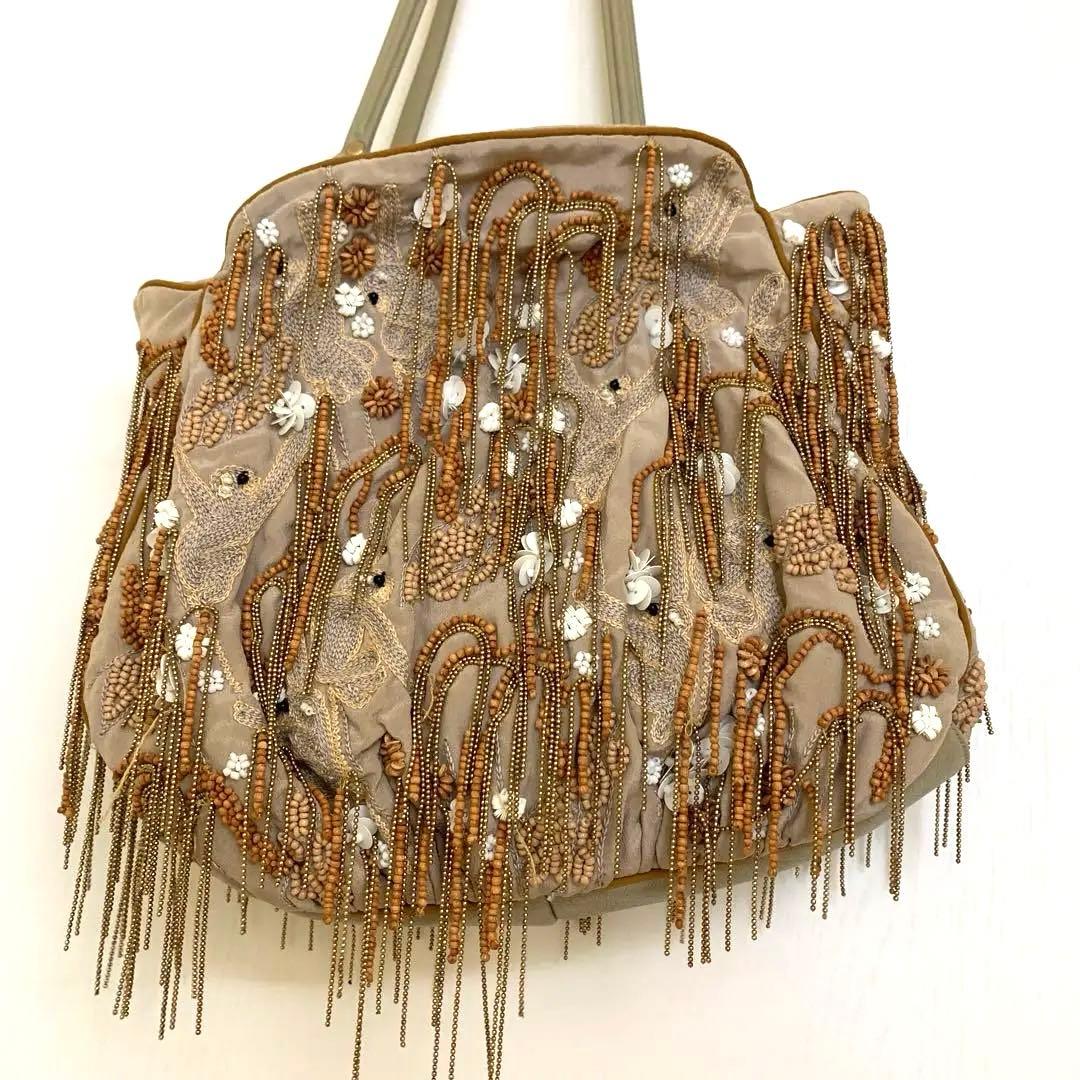 お値下げ中‼️JAMIN PUECH ベージュ ビーズお猿さん装飾 バッグ