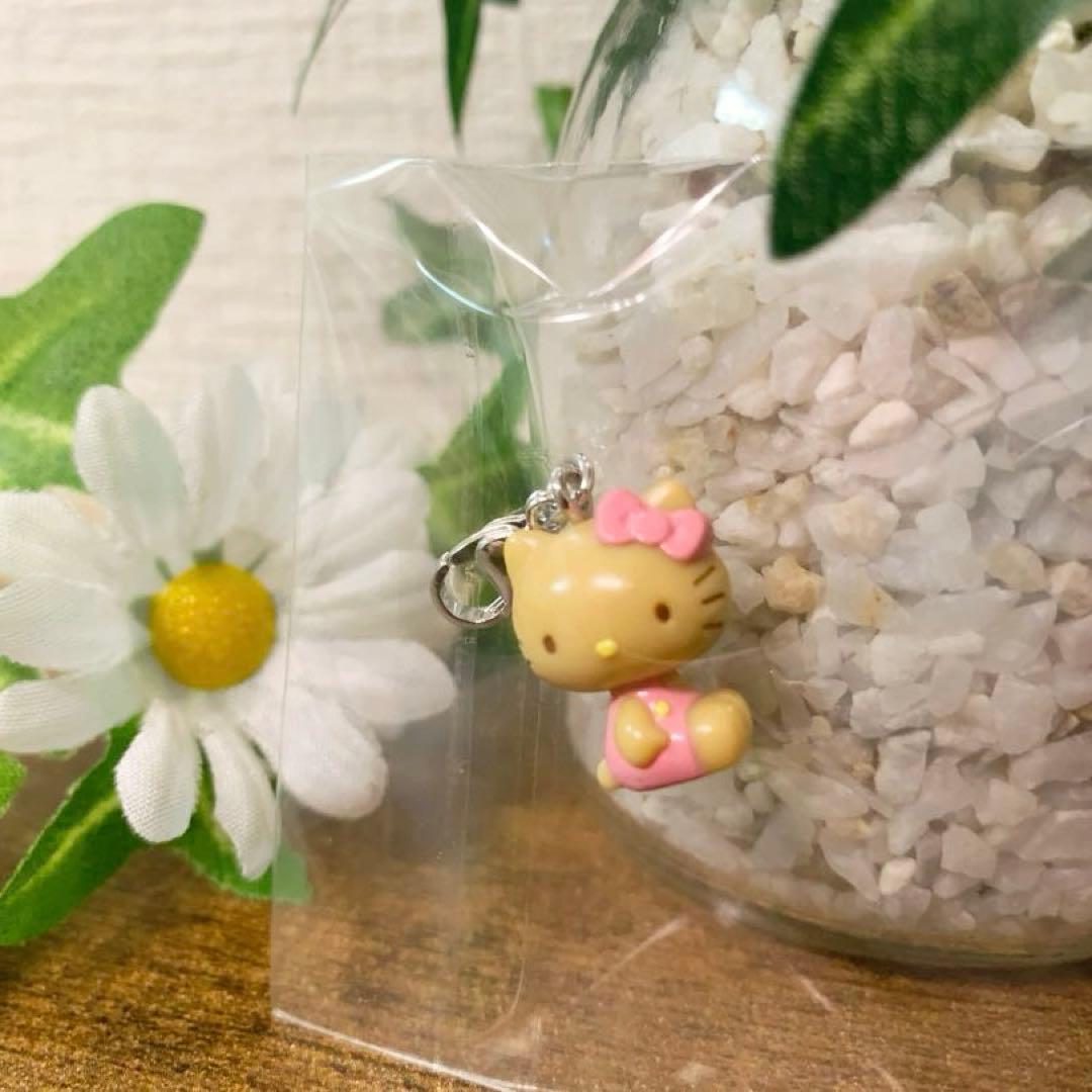 希少レア　ハローキティ　日焼け　横向き　ファスナーマスコット　2001