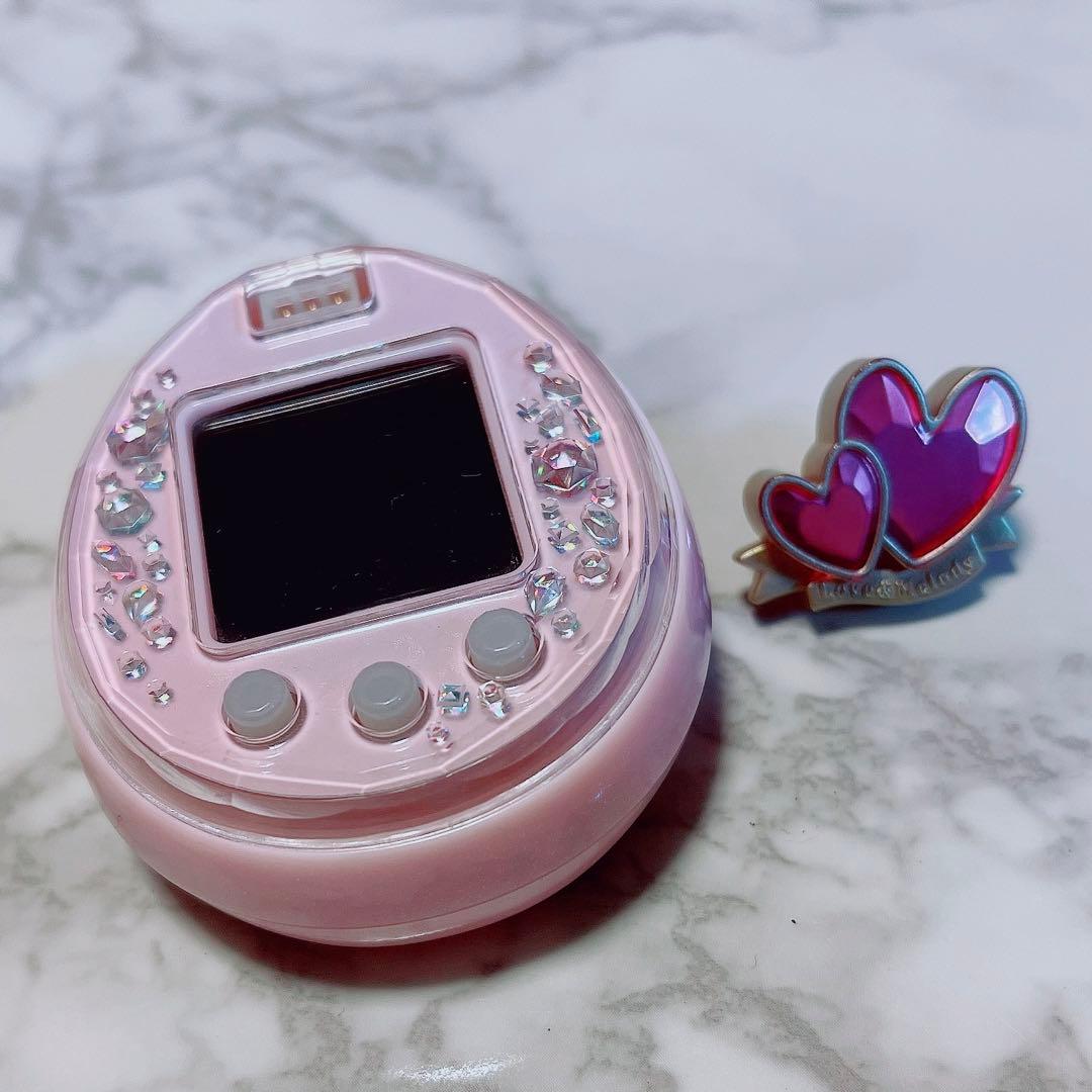 たまごっちピース ピンク たまデコピアス ラブメロver. セット - メルカリ