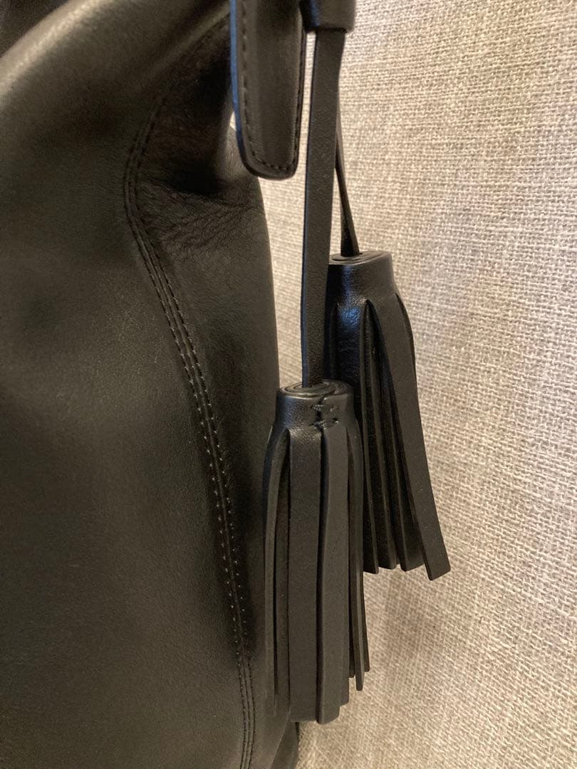 COACH ブラック ショルダーバッグ タッセル付き