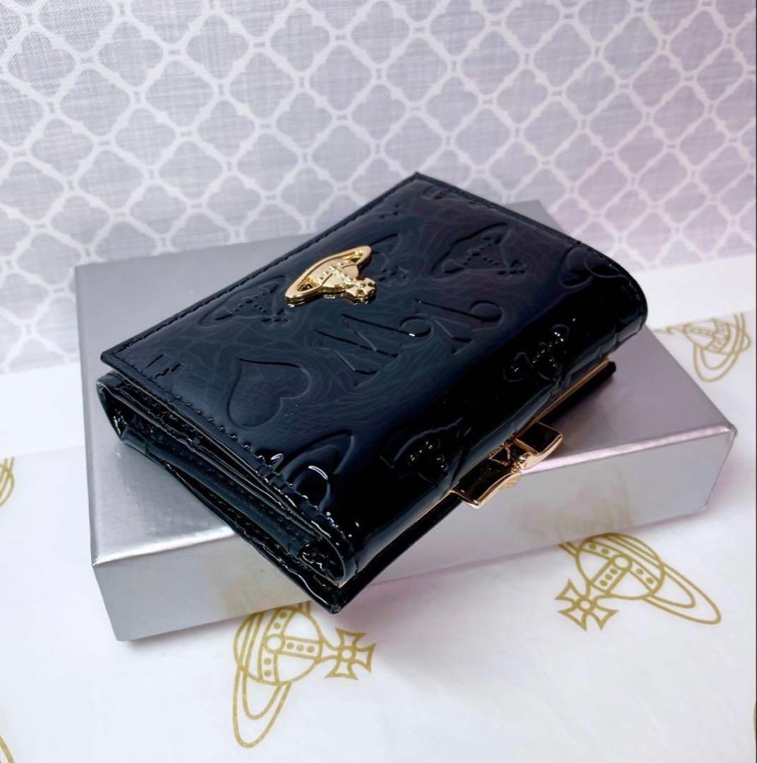 大人気✨️ショッパー付】新品 Vivienne Westwoodエナメル黒 - メルカリ