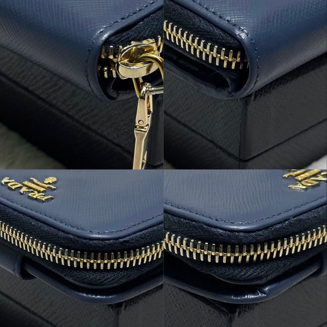 PRADA プラダ 折り財布 ラウンドファスナー ゴールドロゴ ブルーの通販