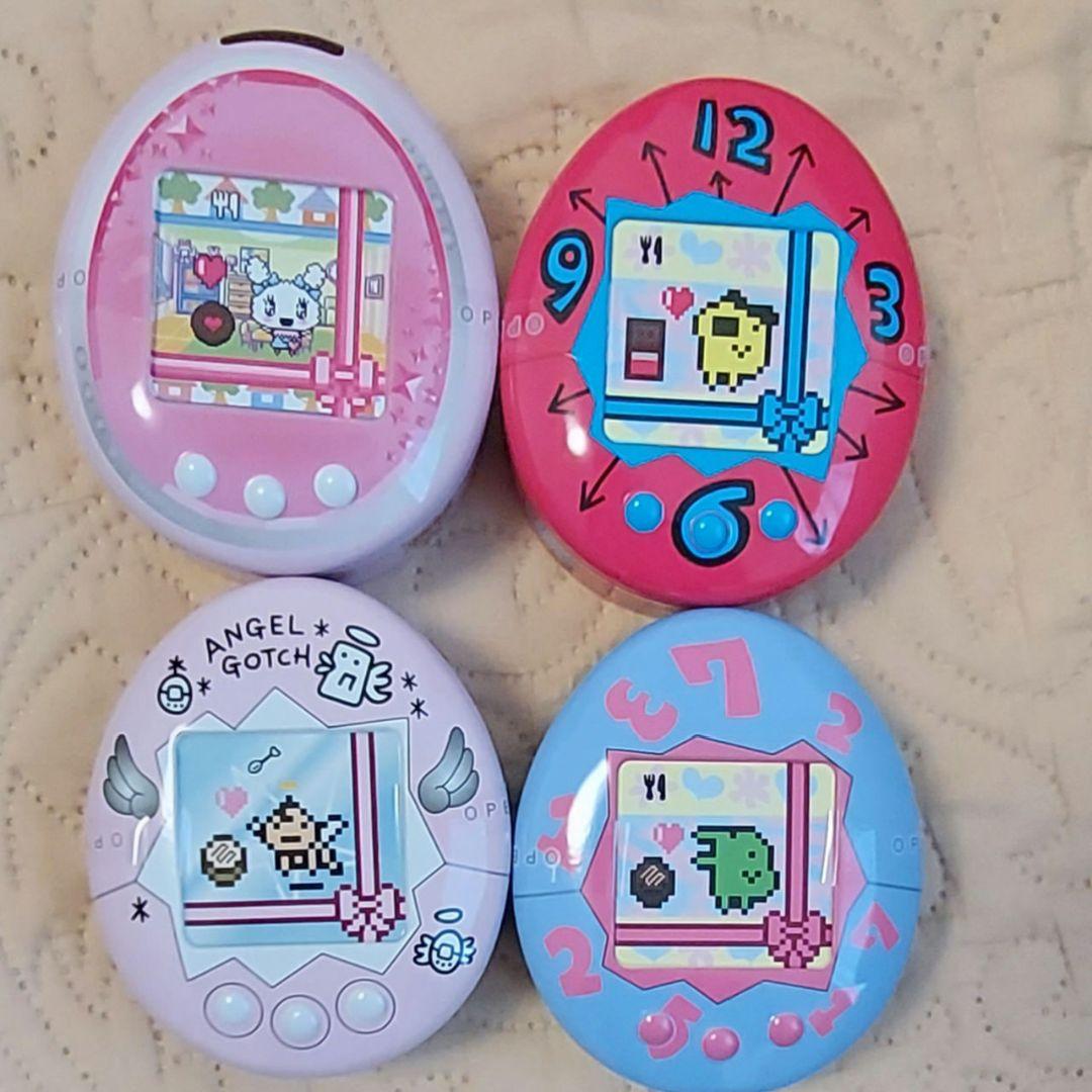 たまごっち チョコ缶 4種セット - メルカリ