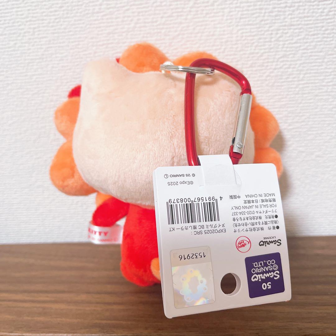 推しカラー サンリオミャクミャク キティBC カラビナ 万博 - メルカリ