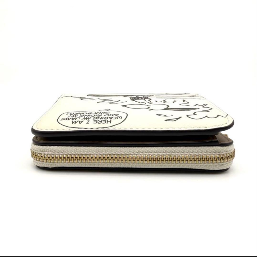 【新品未使用】coachスヌーピー 二つ折り財布コーチスヌーピーSNOOPY