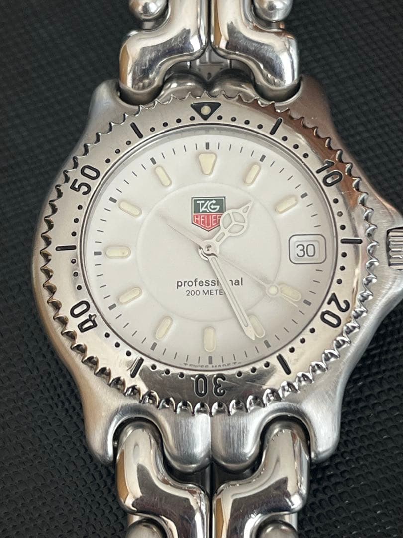 タグホイヤー セルWG1112-KO QZ ホワイト メンズ腕時計 中古美品