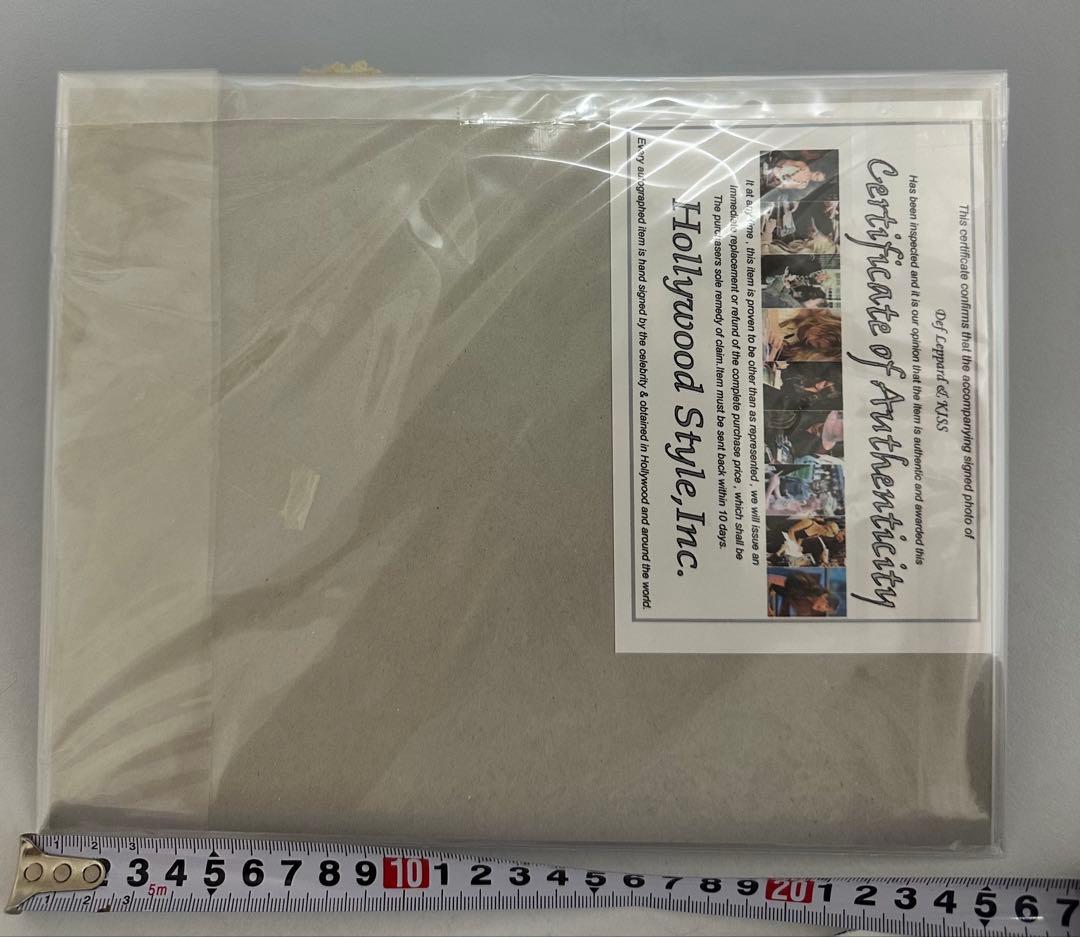 KISSとDef Leppardの共同サイン入り写真と証明書