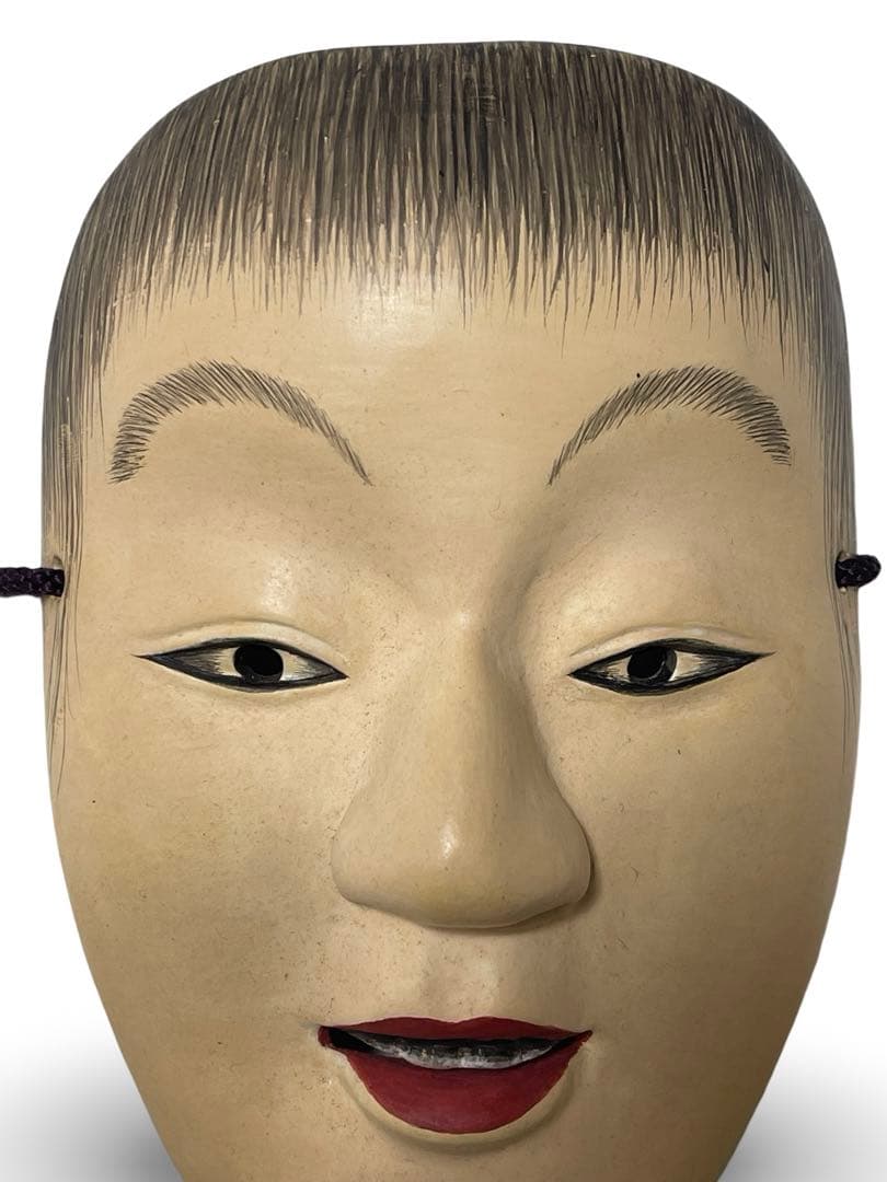 能面 木製 笑顔の表情