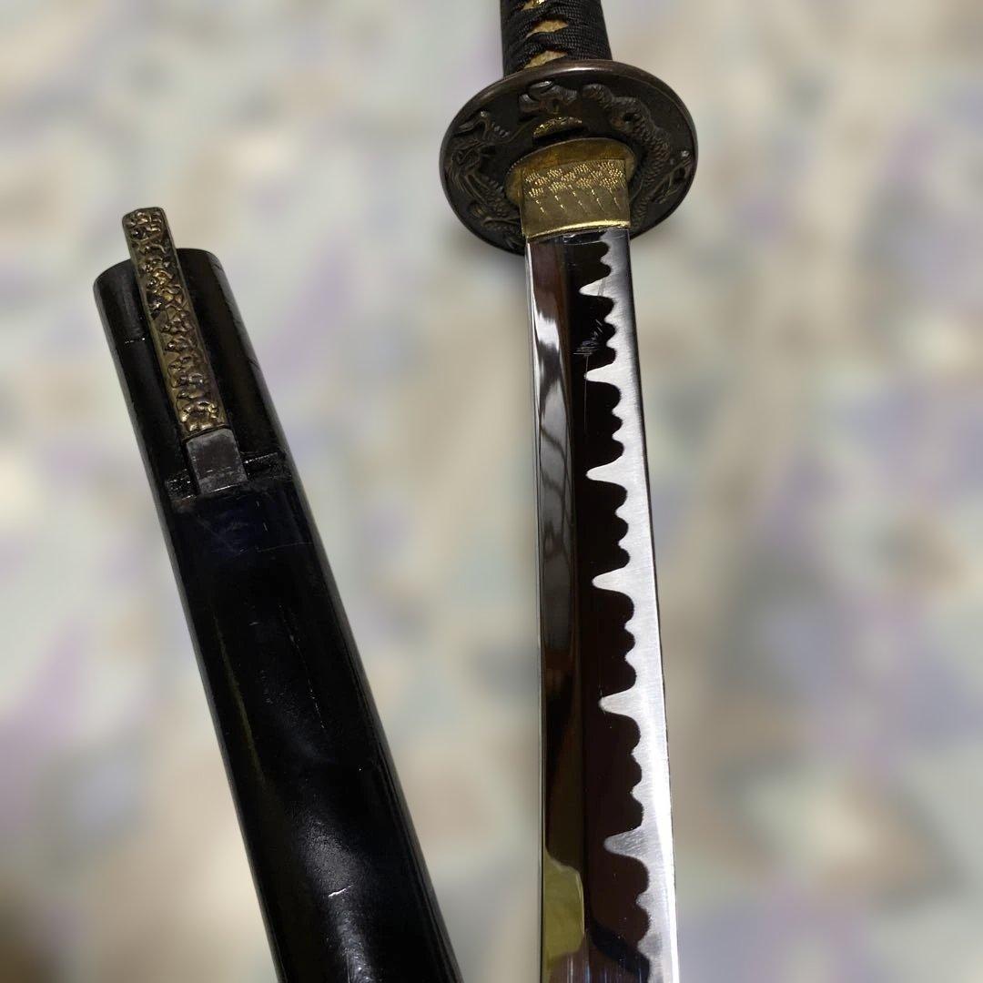 模造刀(小柄付) 黒柄 龍彫楕円鍔 黒呂鞘