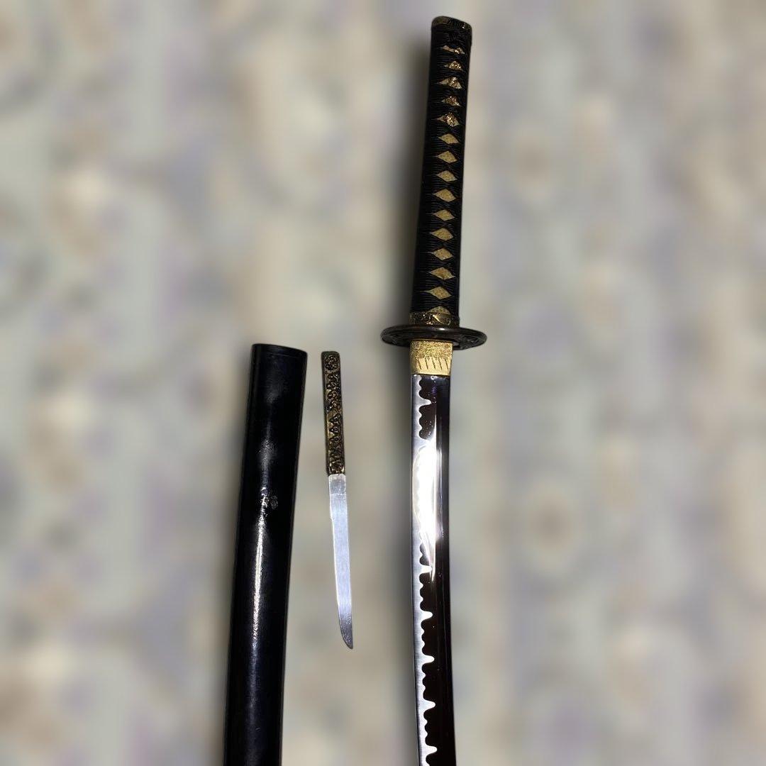 模造刀(小柄付) 黒柄 龍彫楕円鍔 黒呂鞘