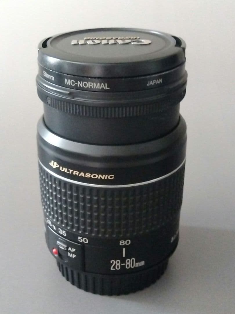 Canon EFレンズ2本（28-80/75-300mm）＋バッグ＋フィルター付