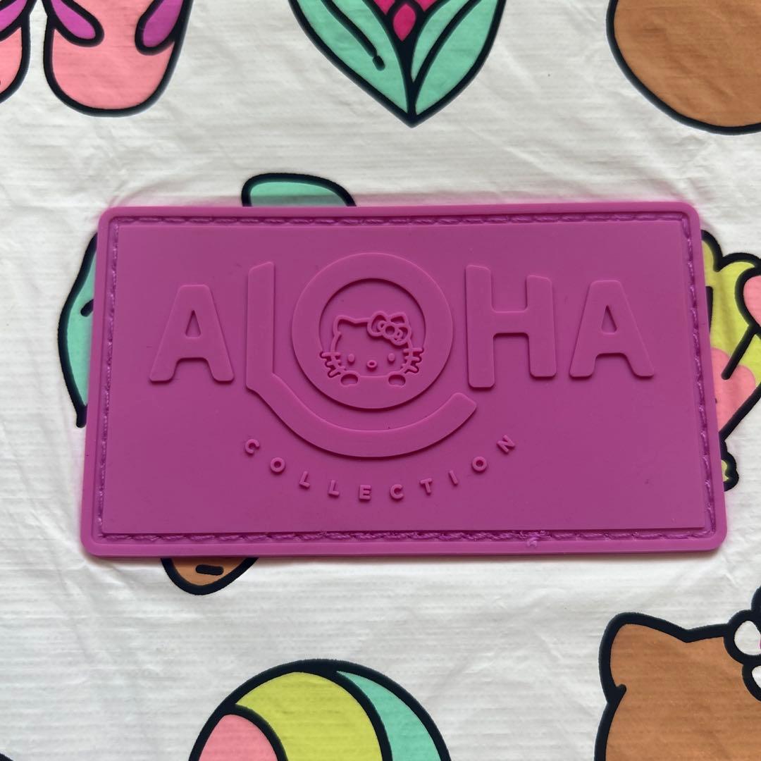 新品　Aloha Collection ハローキティ クラッチバッグ